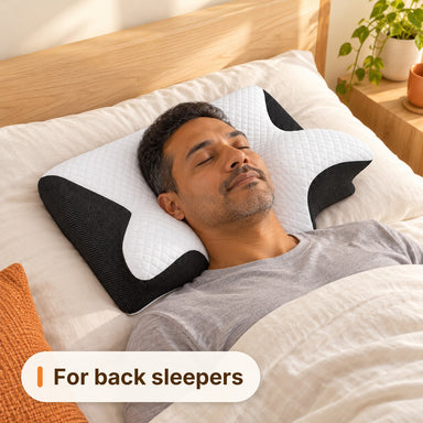 Man sleeping on his back on the Ivalory Contour Relief Pillow